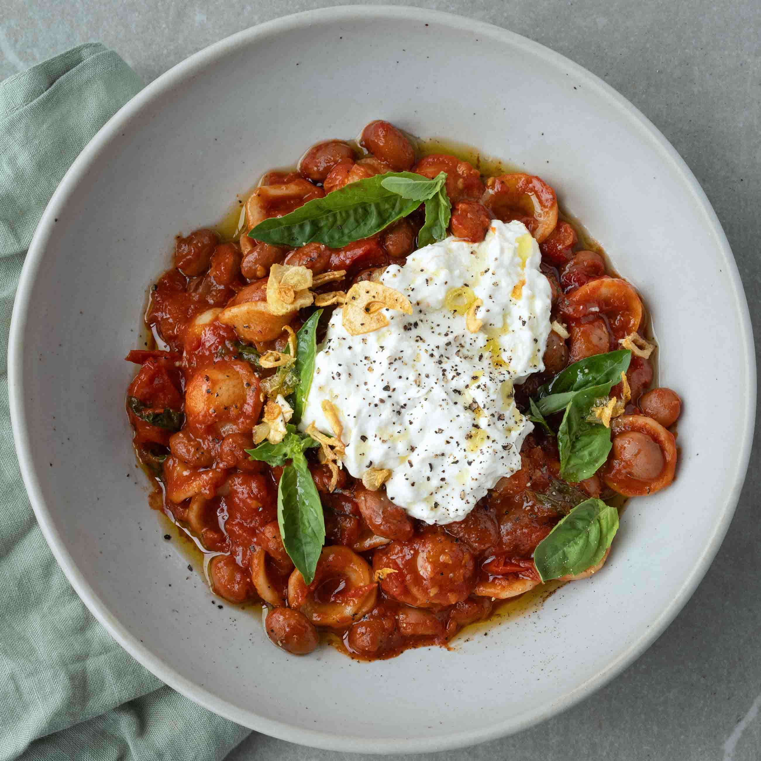 Thumbnail for Blistered Cherry Tomato Orecchiette, With Borlotti, Creamy 'Burrata', Crispy Garlic & Fresh Basil