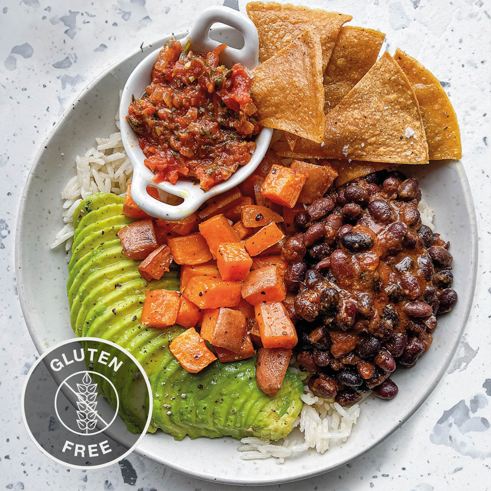 Dish photo for Chipotle Black Bean Burrito Bowl With Roasted Sweet Potato, Avocado, Salsa Roja, Lime Crema & Tortilla Dippers