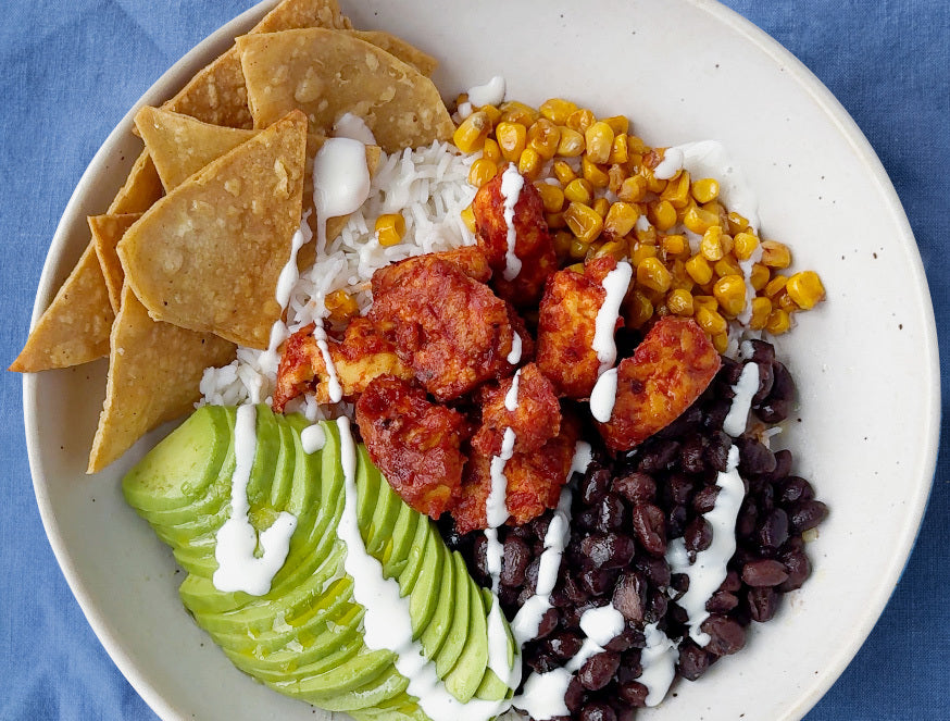 Dish photo for Smoked Tofu Chipotle Burrito Bowl With Black Beans, Avocado, Charred Corn & Crispy Tortillas