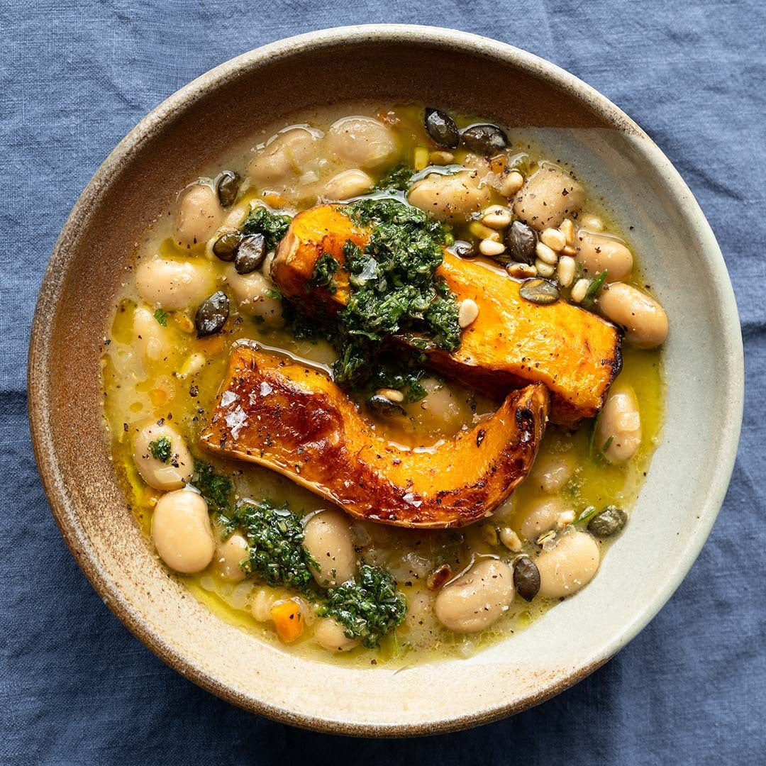Dish photo for Rich & Creamy Brothy Butter Beans With Roasted Squash, Salsa Verde, Toasted Pine Nuts & Pumpkin Seeds