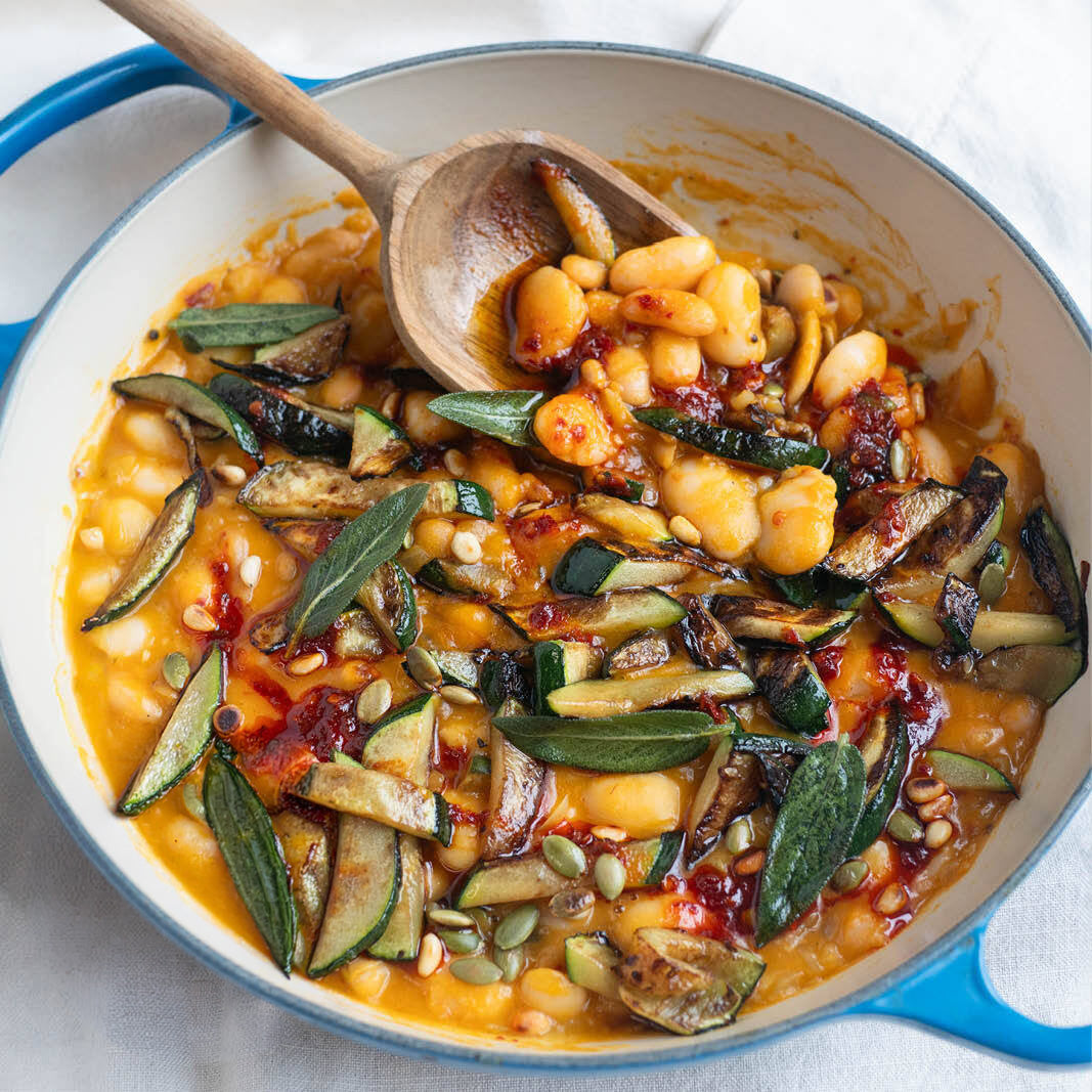 Thumbnail for Butternut Squash Brothy Beans With Charred Courgette, Crispy Sage, Hot Agave 'Nduja' Dressing, Toasted Pine Nuts & Pumpkin Seeds