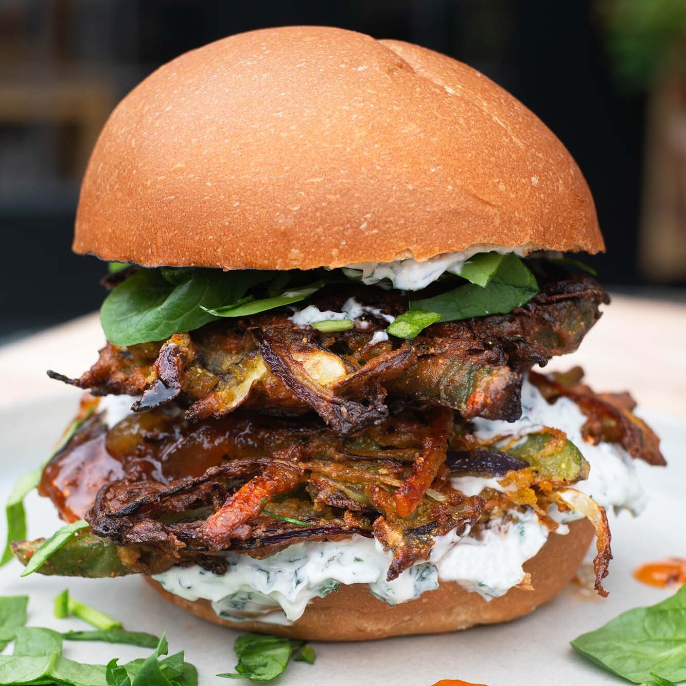 Dish photo for Crispy Pakora Burger With Mint Raita, Mango Chutney, Fresh Spinach & Baby New Potatoes