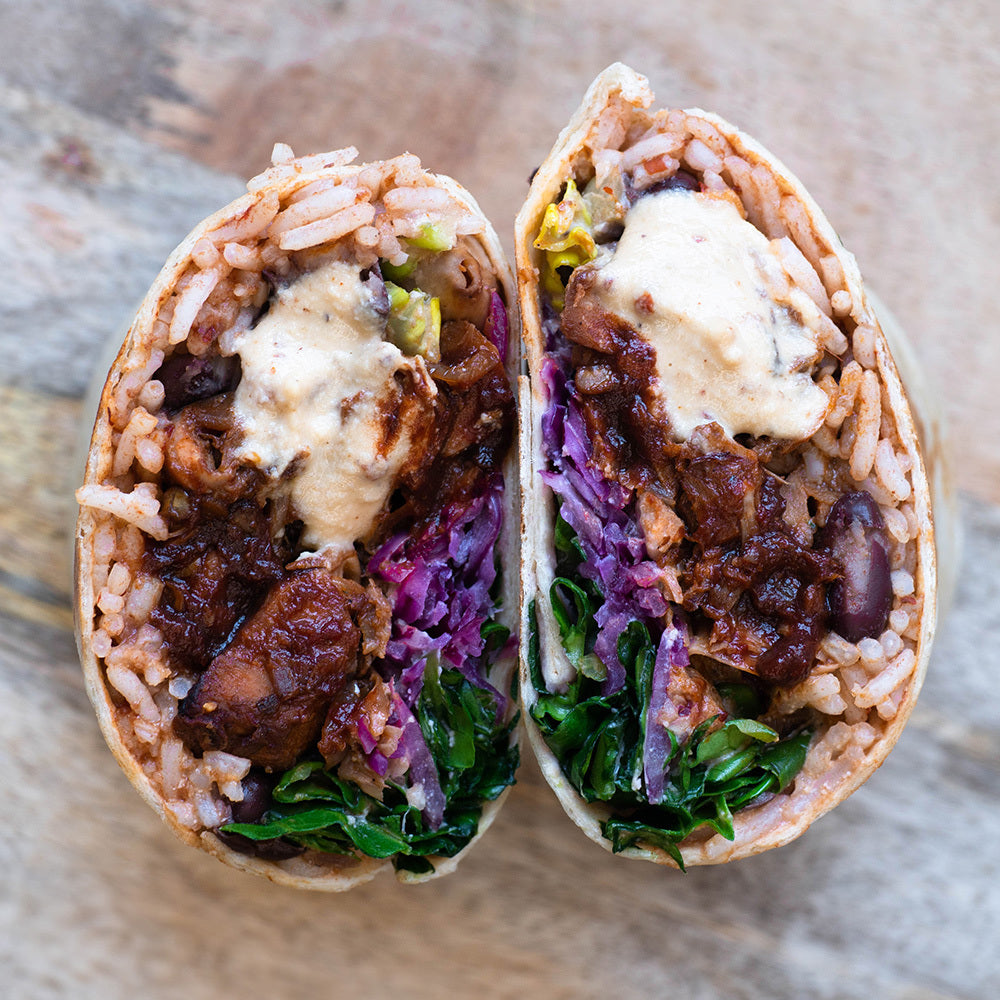 Dish photo for Jackfruit Carnitas Burrito With Smokey Chipotle Crema, Fluffy Rice, Black Beans & Fresh Salad