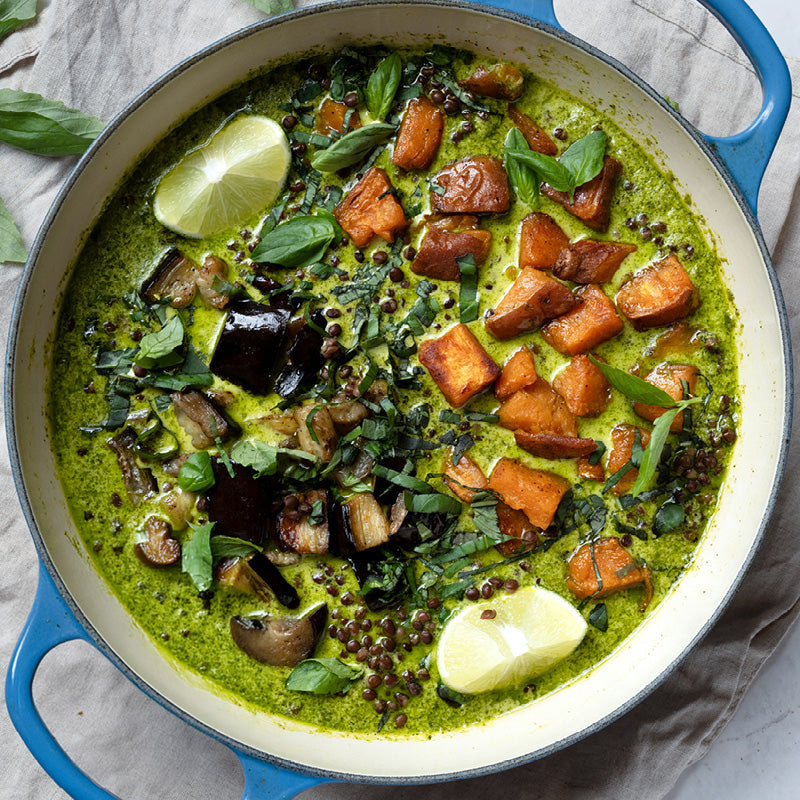 Thumbnail for Aromatic Thai Green Curry Soup With Beluga Lentils, Tender Aubergine, Sweet Potato, Basil & Lime