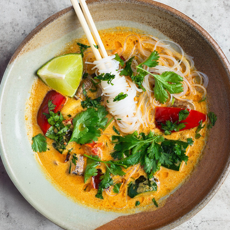 Dish photo for Thai Red Curry With Noodles, Red Pepper, Chestnut Mushrooom, Courgette, Lime & Coriander