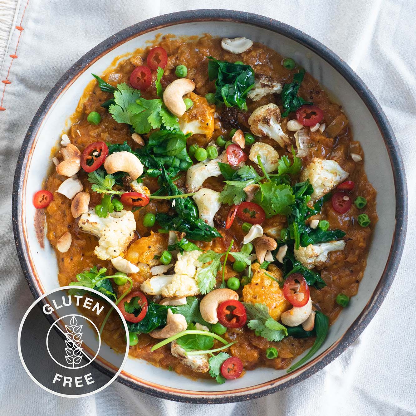 Dish photo for Mango Cauliflower Curry With Cashews, Garden Peas, Coriander and Fluffy Basmati Rice