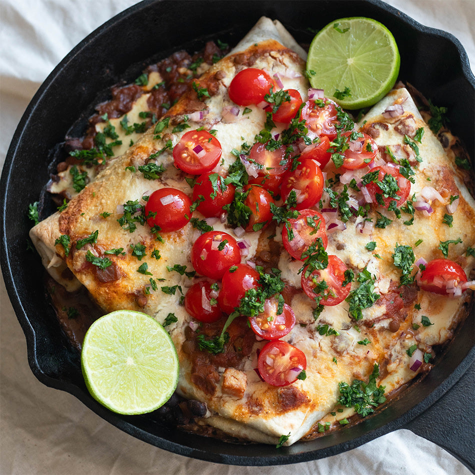 Thumbnail for Black Bean Chilli Enchiladas Topped With Cashew Cheese Sauce & A Zingy Cherry Tomato Salsa