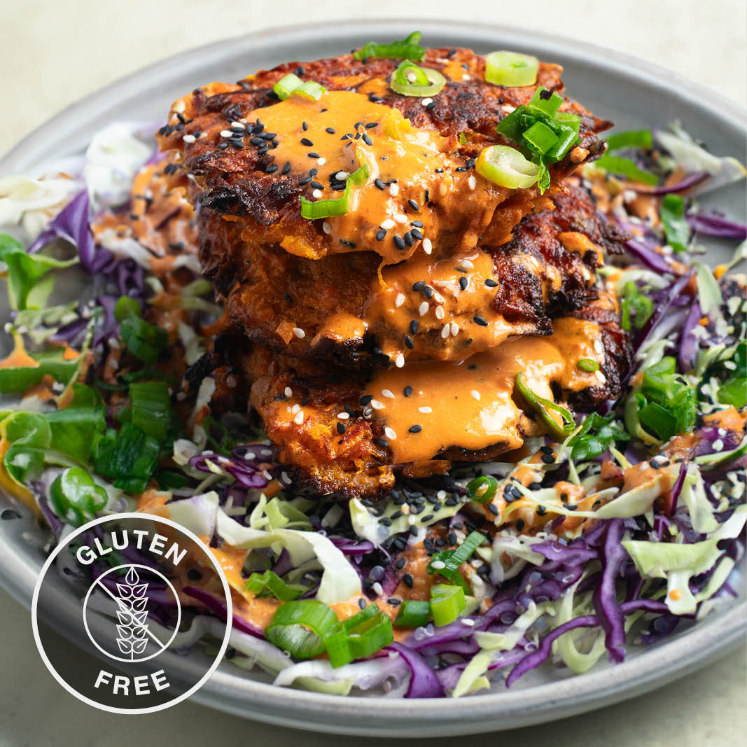 Dish photo for Thai Red Curry Sweet Potato Fritters Over Crunchy Mixed Veg & Quinoa Slaw With Aromatic Red Curry Dressing