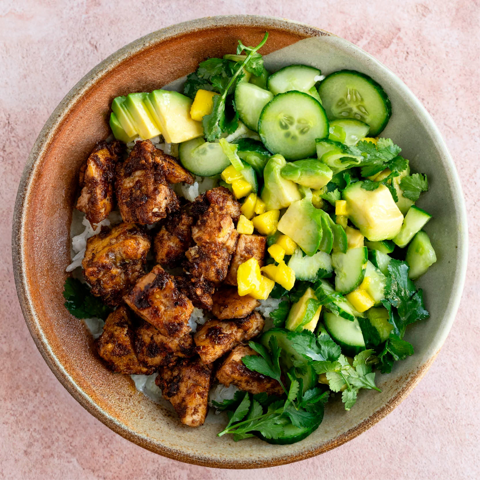 Dish photo for Sweet & Spicy Jerk Tofu Over Fluffy Coconut Rice, With Mango, Avocado & Cucumber Salad