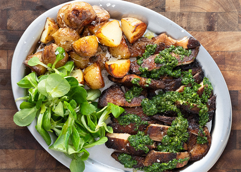 Dish photo for Lion's Mane Steak With Chimichurri, Crispy Baby Potatoes, Watercress & Béarnaise sauce