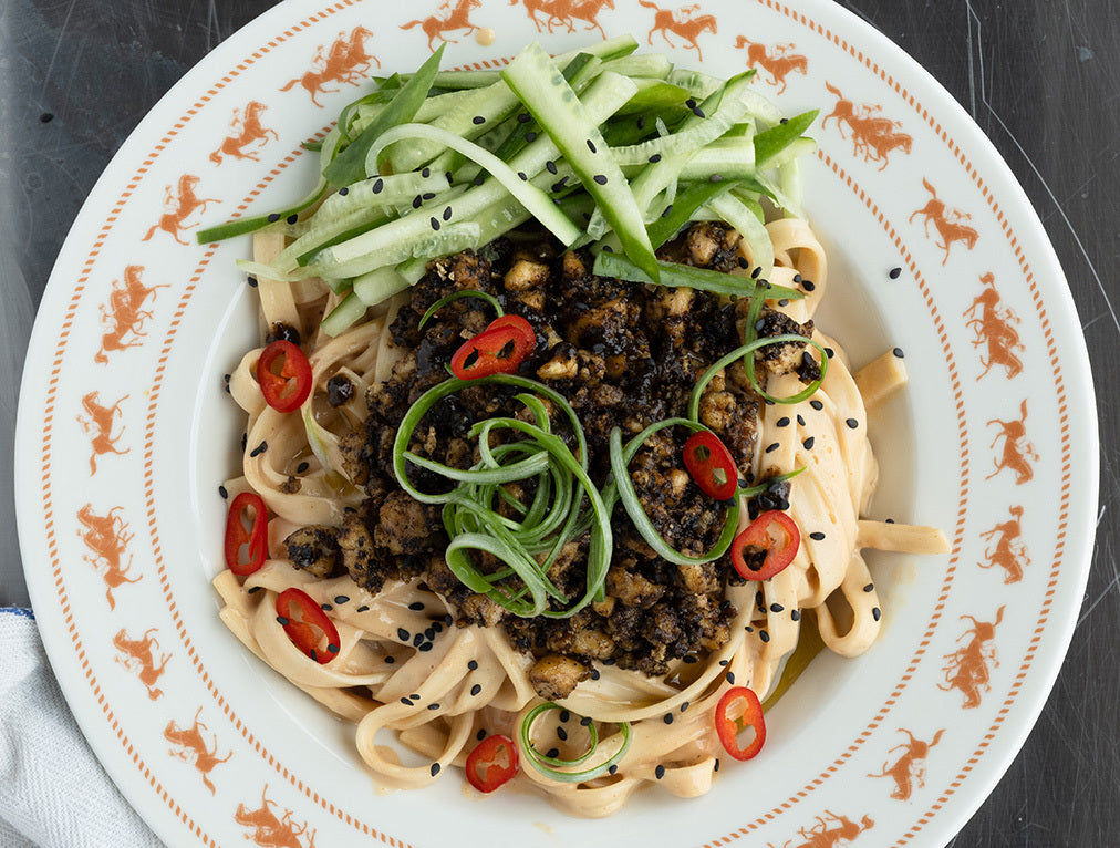 Dish photo for Mapo Tofu Udon Noodles In Creamy Gochujang Sauce With Fresh Cucumber Salad & Toasted Sesame Seeds