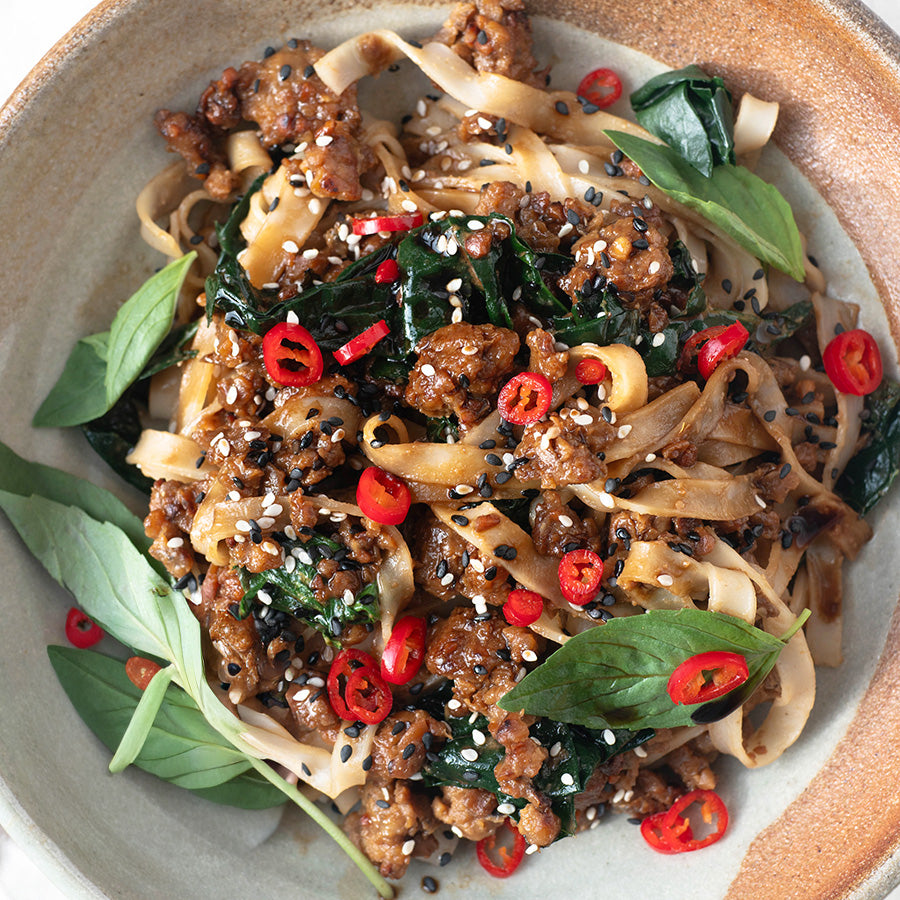 Dish photo for Sesame Noodles With Crispy Tempeh Mince, Braised Cavolo Nero & Fragrant Thai Basil
