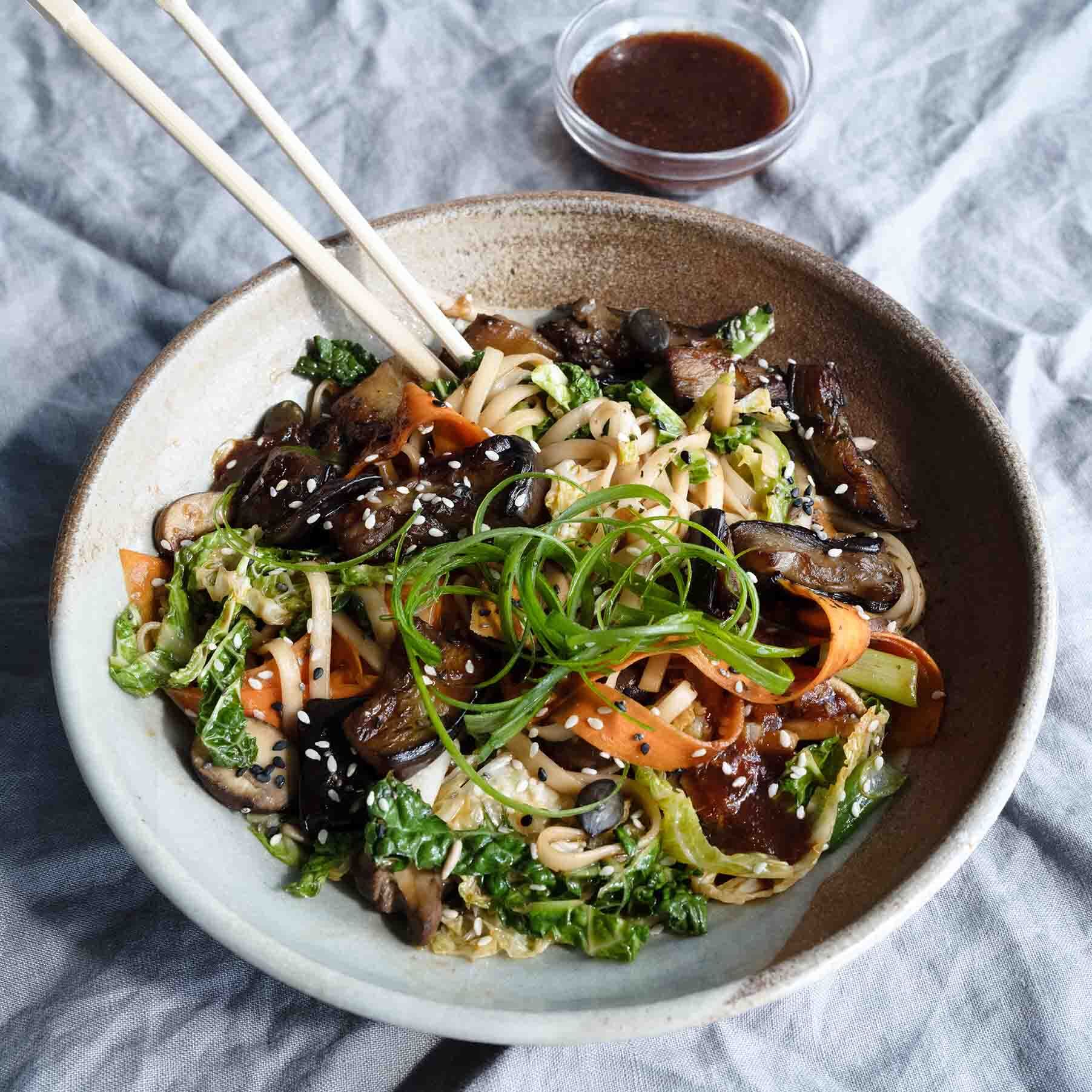 Dish photo for Yaki Udon Noodles With Aubergine, Savoy Cabbage, Carrot, Mushroom & Omega 3 Superseed Furikake