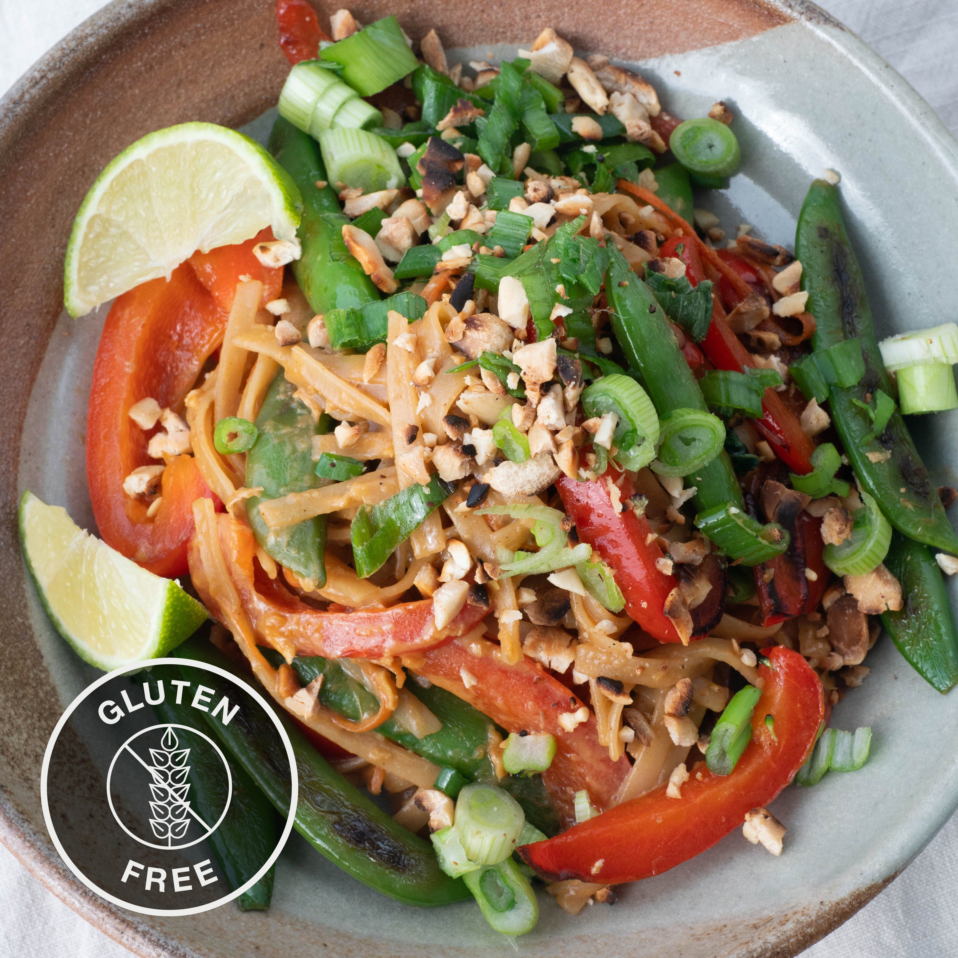 Dish photo for Pad Thai Noodles With Sugar Snap Peas, Red Pepper, Carrot, Crushed Peanuts & Spring Onion