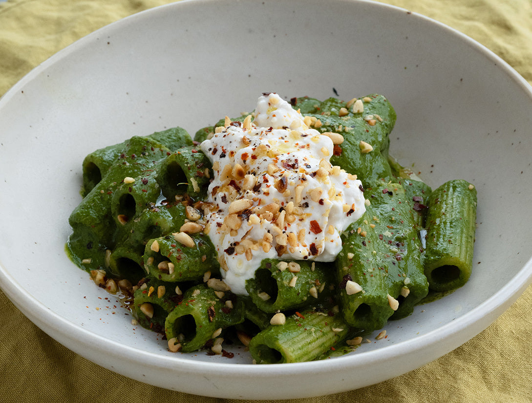 Dish photo for Super Green Wholewheat Rigatoni With Wild Garlic Sauce, Peas, Cavolo Nero, Creamy 'Burrata' & Chilli Pine Nut Crumb