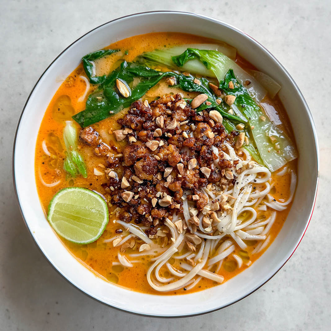 Dish photo for Peanut Butter Ramen With Smoky Garlic & Sesame Tempeh, Pak Choi, Toasted Peanuts & Lime