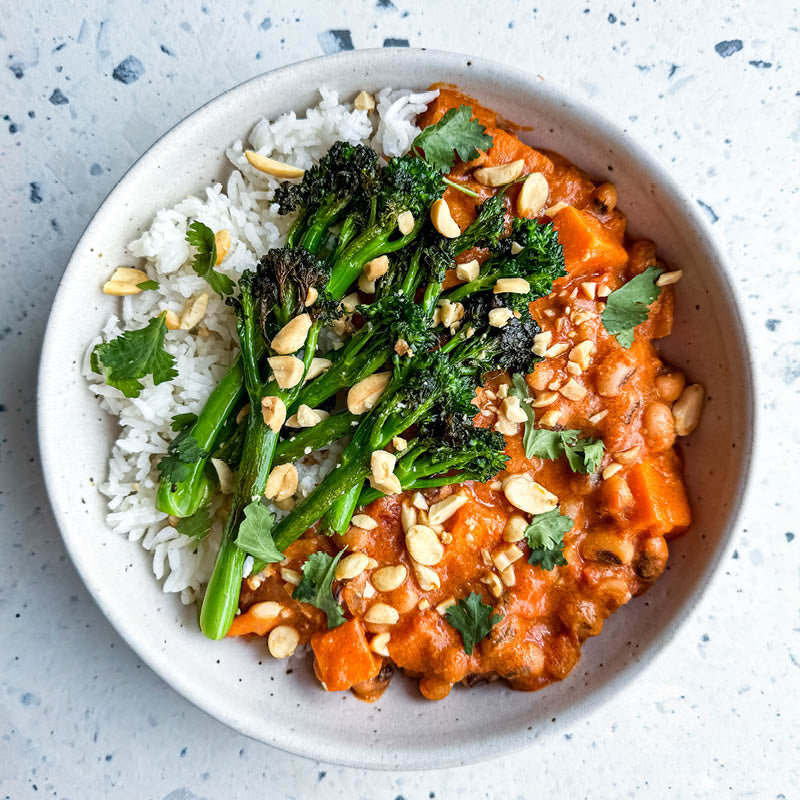 Dish photo for Gut-Friendly West African Inspired Peanut Stew With Black Eyed Peas, Sweet Potato & Tenderstem Broccoli