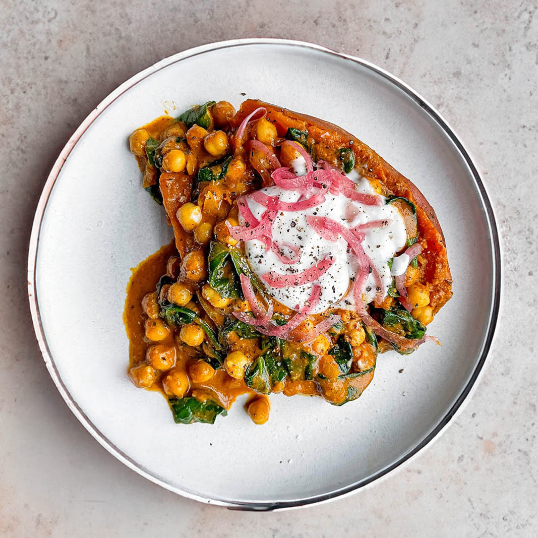 Dish photo for Roasted Sweet Potato With Curried Chickpeas, Baby Spinach, Organic Cultured Soy Yoghurt & Pink Pickled Onions