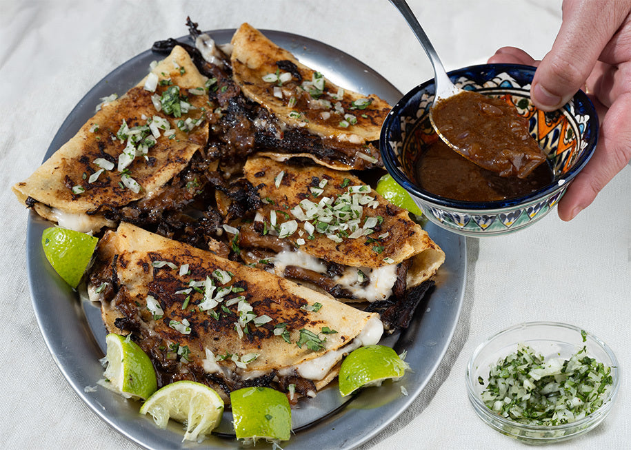 Dish photo for Mushroom Birria Tacos With Melted House Queso, Onion Salsa & Rich Dipping Consommé