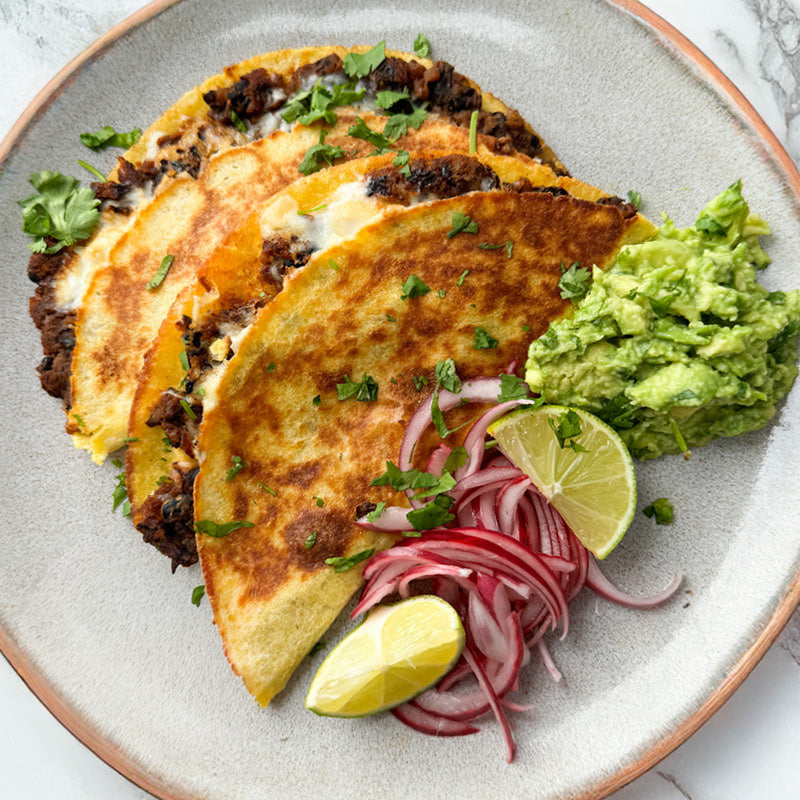 Thumbnail for Crispy Chipotle Pumpkin & Black Bean Tacos With Melted 'Mozzarella', Guacamole & Pink Onion Pickles