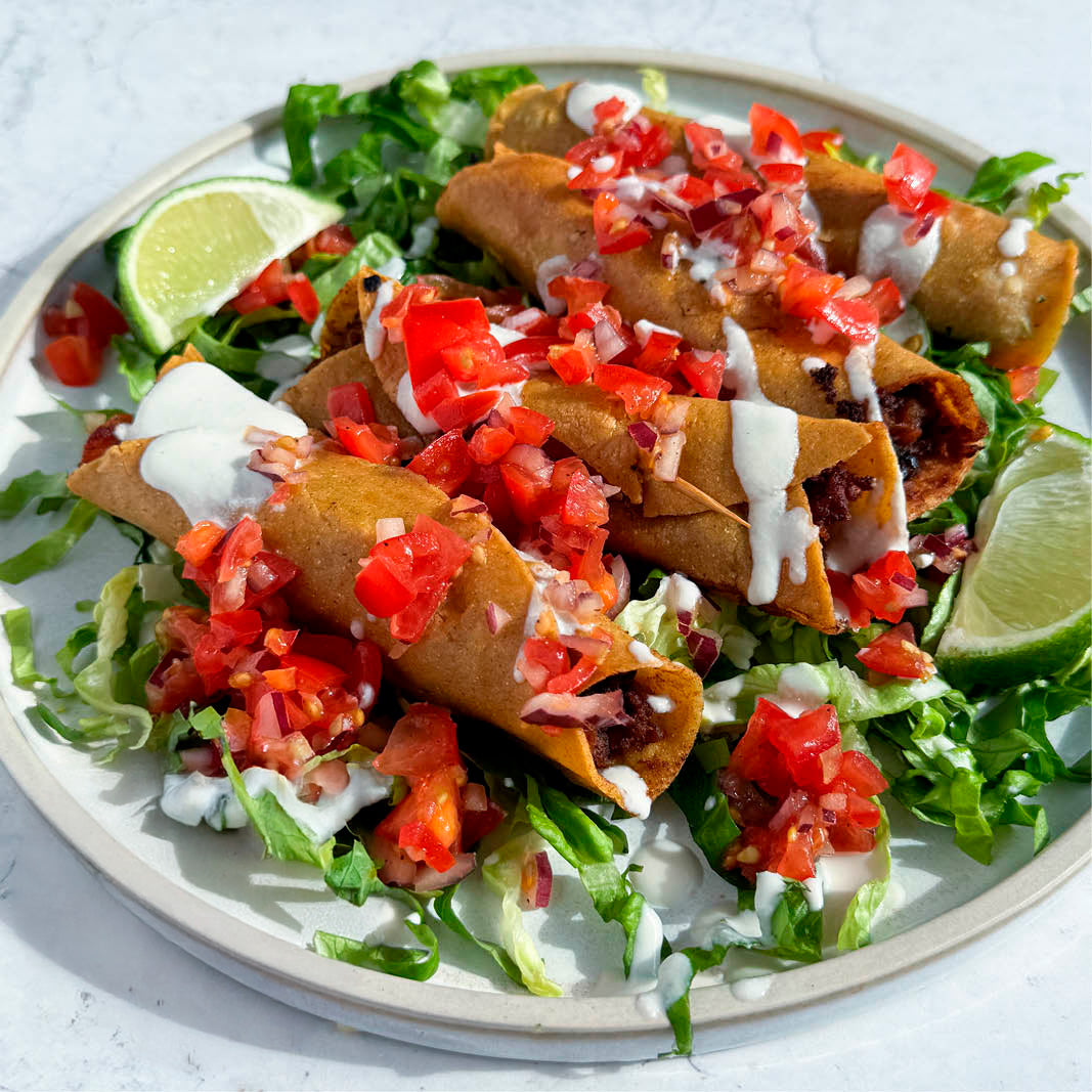 Dish photo for Crispy Sweet Potato & Black Bean Taquitos With Cashew 'Feta' Crema & Salsa Fresca