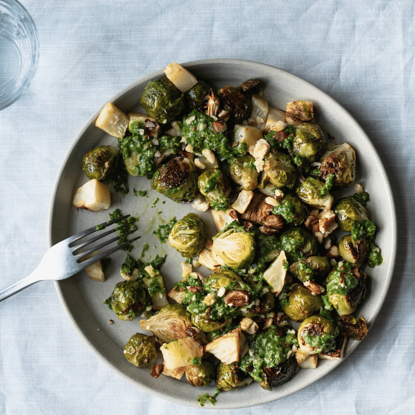 Thumbnail for Crispy Caramelised Brussels Sprouts & Parsnips With Farro, Tangy Caper Salsa Verde & Toasted Hazelnuts