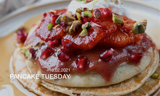 RHUBARB AND BLOOD ORANGE PANCAKES WITH PISTACHIOS AND COCONUT YOGHURT