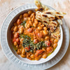Creamy Tomato Butter Beans With Baby Spinach, Almond Gremolata & Pillowy Soft Garlic & Herb Flatbread