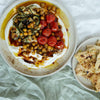 Hot 'Honey' Labneh Mezze With Minted Courgettes, Roasted Cherry Tomatoes, Chickpeas & Freshly Baked Garlic Flatbread