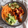 Crispy Gochujang Tofu Bowl With Cucumber Pickle, Creamy Avocado & Toasted Sesame Seeds