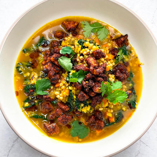 Brothy Giant Cous Cous Bowl With Smokey Tempeh 'Chorizo', Cavolo Nero & Fresh Coriander