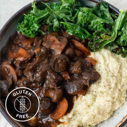 Slow-Cooked Mushroom Bourguignon Over Creamy Mash With Green Kale