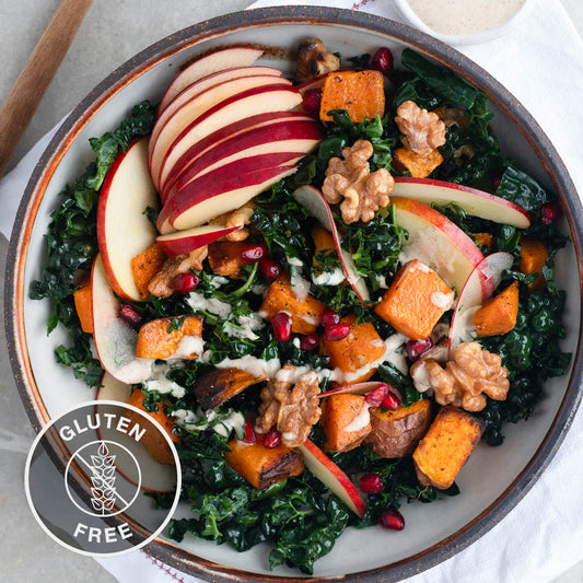 Winter Harvest Bowl With Roasted Sweet Potato, Candied Walnuts & Maple Tahini Dressing