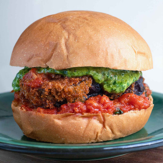 Aubergine Parmigiana Sandwich With Pesto Mayo & Rich Tomato Reduction On Soft Vegan Brioche