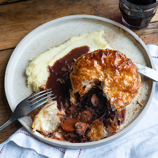 Festive Bourguignon Pie Over Creamy Mash With Caramelised Onion Red Wine Gravy