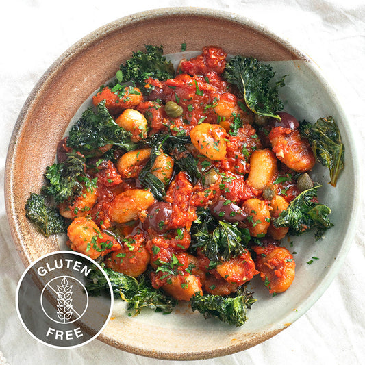 Crispy Cauliflower Gnocchi With Puttanesca Sauce, Crispy Kale & Fresh Parsley