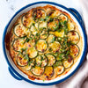 Courgette Gratin With Cashew Cheese Sauce, Creamy Cannellini Beans And Olive & Almond Gremolata