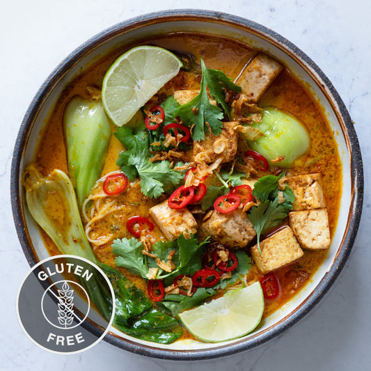 Rich & Fragrant Laksa With Tofu, Pak Choi, Vermicelli Noodles, Crispy Shallots, Chilli, Coriander & Lime