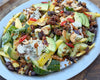Mango Crispy Rice Salad With Smacked Cucumber, Avocado, Black Beans, Toasted Cashews, Tahini & Chilli Crunch Dressing