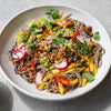 Mango Soba Noodle Salad With Avocado, Edamame, Cashews, Pickled Radish, Toasted Seeds & Crispy Onions