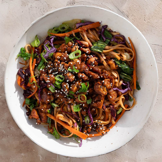 High Protein Chilli Garlic Tempeh Noodles With Crunchy Rainbow Vegetables & Toasted Sesame Seeds