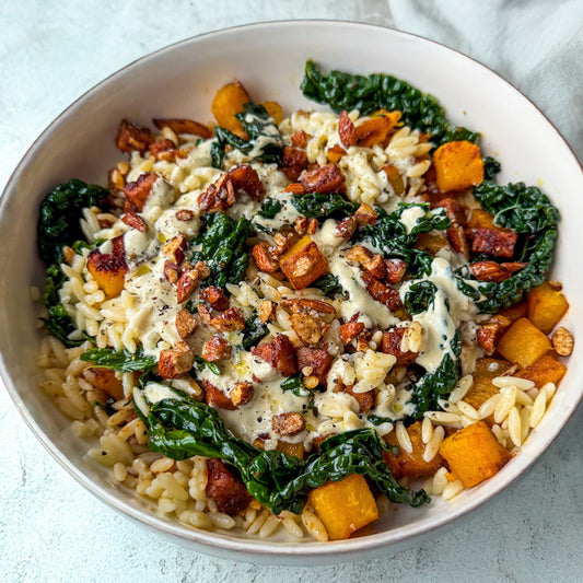 Winter Caesar Salad With Orzo, Butternut Squash, Tempeh 'Lardons', Cavolo Nero & Candied Almond Crunch