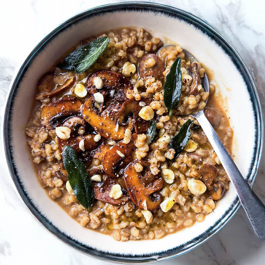 Rich Pearl Barley Mushroom Risotto With Braised Cavolo Nero, Toasted Hazelnuts & Crispy Sage