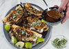 Mushroom Birria Tacos With Melted House Queso, Onion Salsa & Rich Dipping Consommé