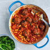 High Protein Tempeh Meatballs In Smoky Tomato Sauce With Cannellini Beans & Braised Green Kale