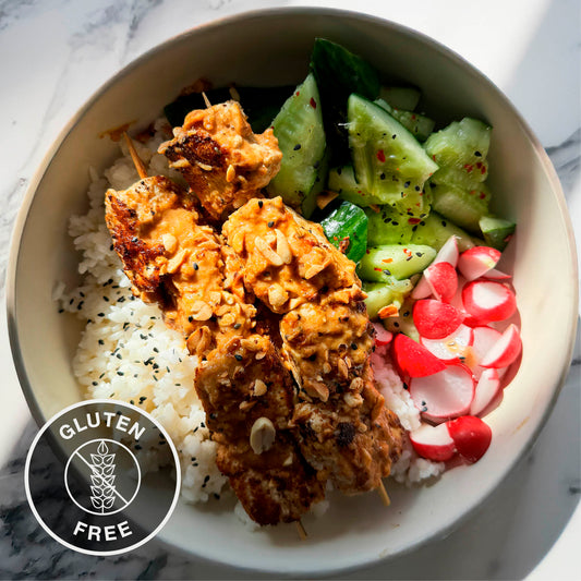 Tofu Satay Skewer Bowl With Zingy Smacked Cucumbers, Pink Radish, Sushi Rice & Sesame Peanut Garnish